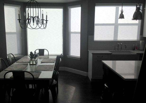 light filtering roller shades in open floor plan home in Littleton CO
