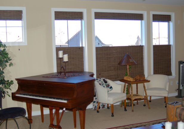 top down woven wood shades with top woven valance in living room in Denver CO