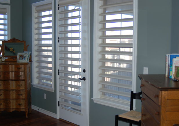 Entryway door with pirouette window shades in Englewood CO