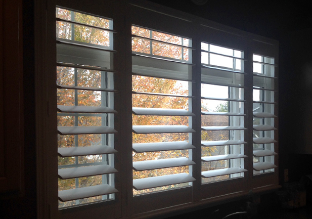 open vinyl window shutters in Denver CO