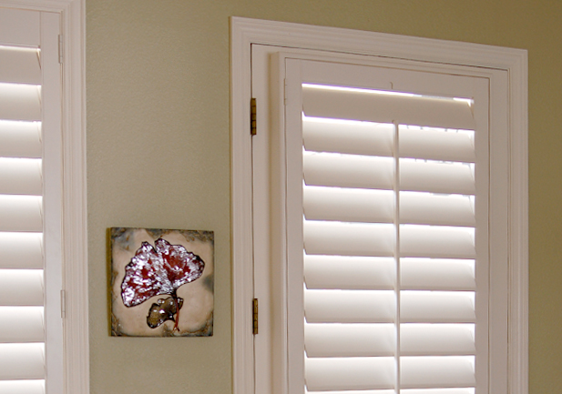 narrow windows with white interior shutters in Westminster CO