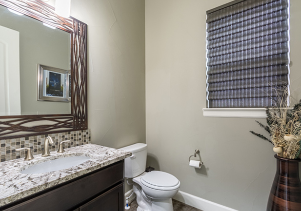 roman shades on bathroom window in Westminster CO