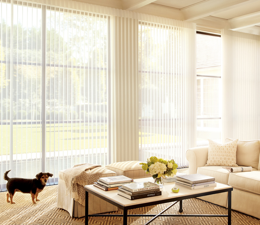 living room floor to ceiling windows covered with vertical shades luminette privacy sheers Westminster CO