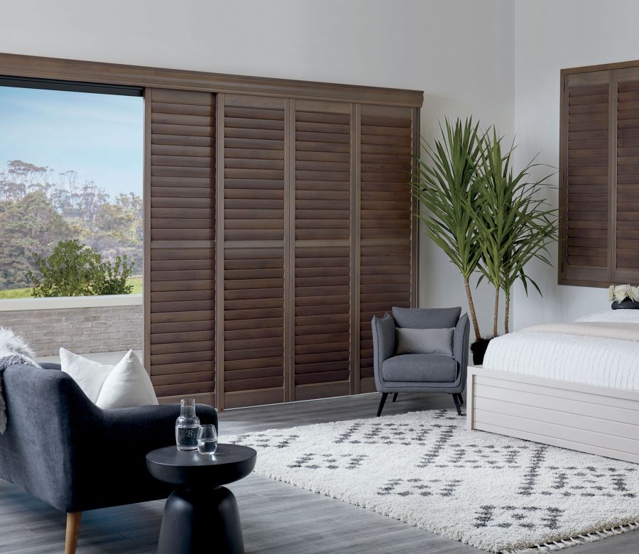 Wood plantation shutters for sliding doors in Denver CO home