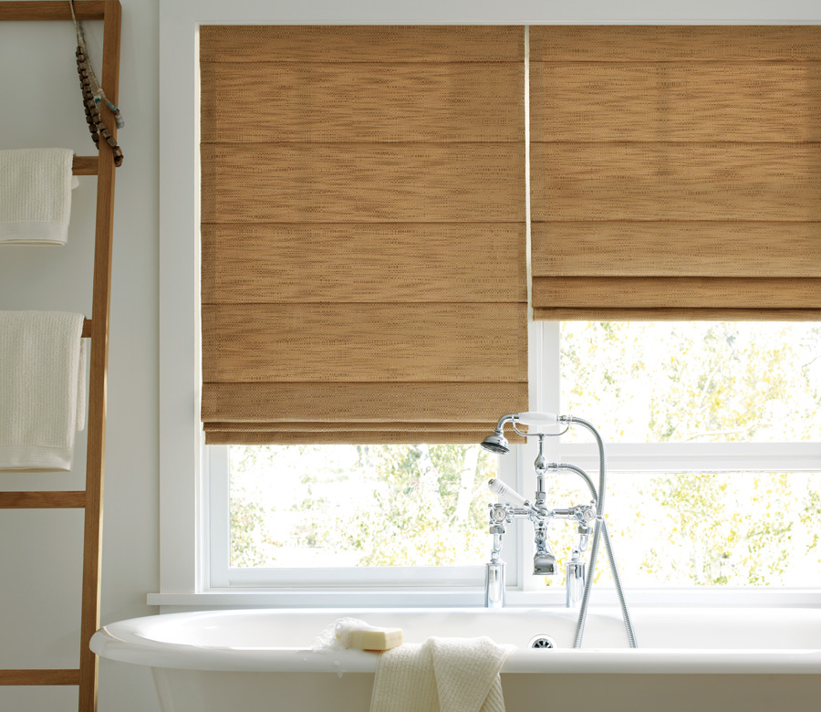 fabric roman shades over tub in master bath in Westminster CO
