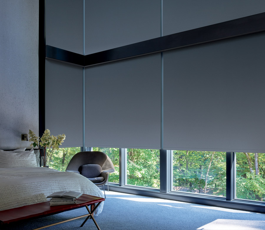 designer roller shades offer blackout in Denver CO bedroom