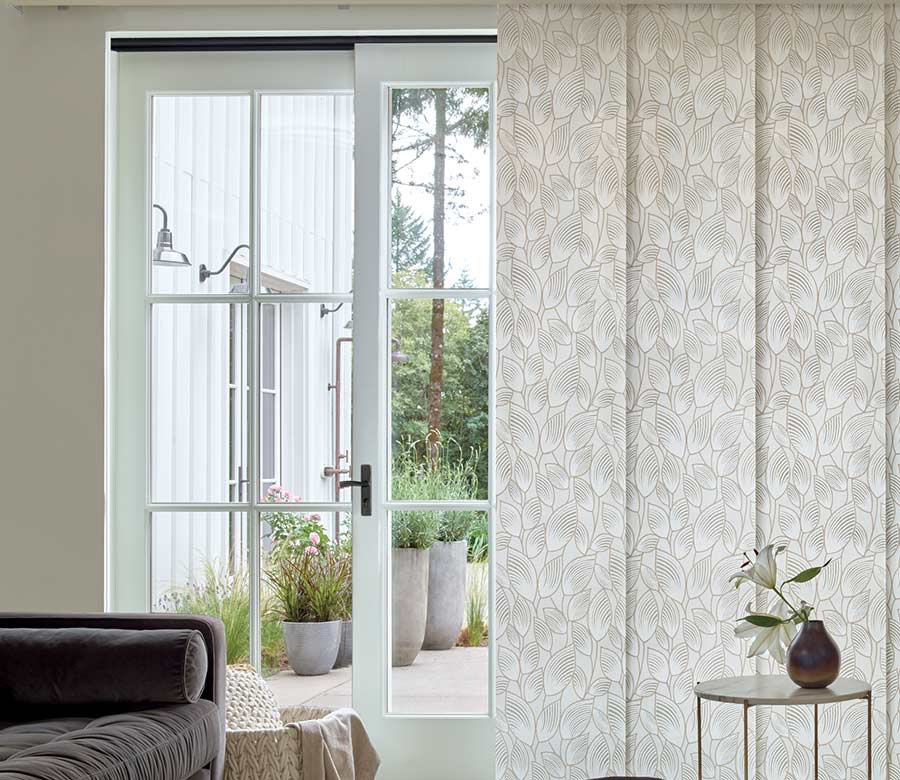 sliding doors covered with patterned vertical shades in Englewood CO