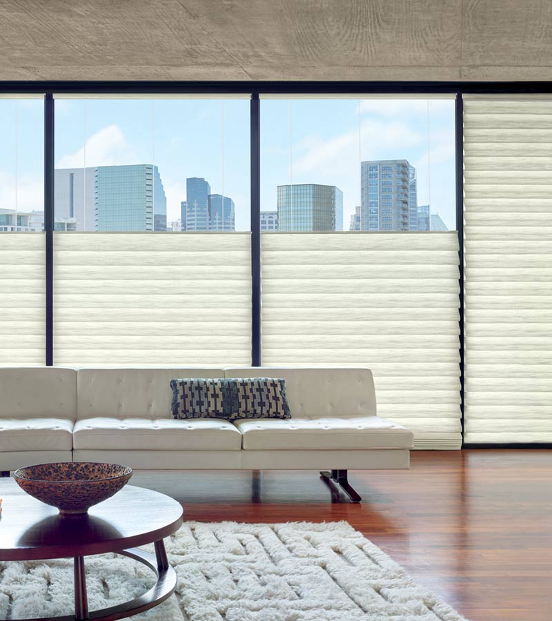 top down modern roman shades on floor to ceiling windows in Denver CO