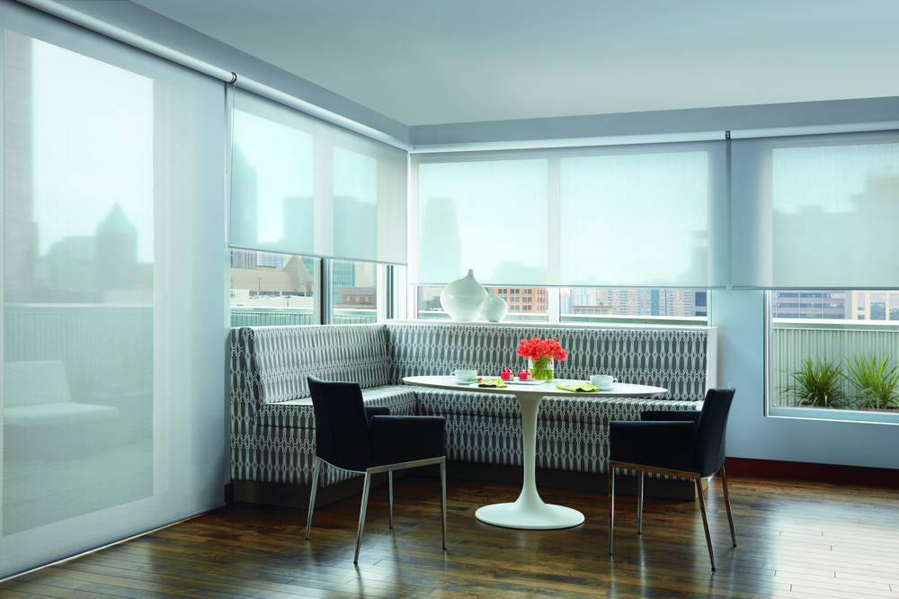 custom roller shades in dining room on floor to ceiling windows in Denver CO