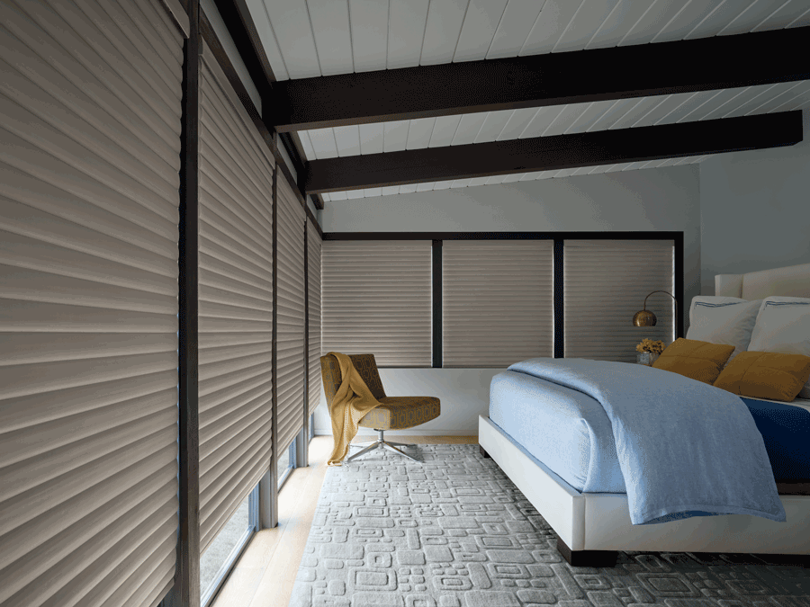 Bedroom with smart shades.