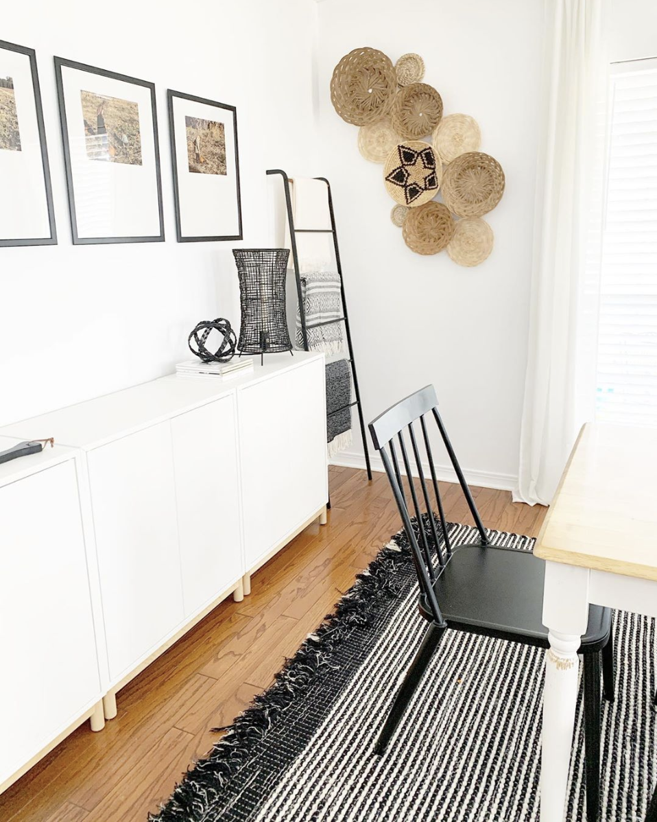 Black frames and baskets act as feature wall. 