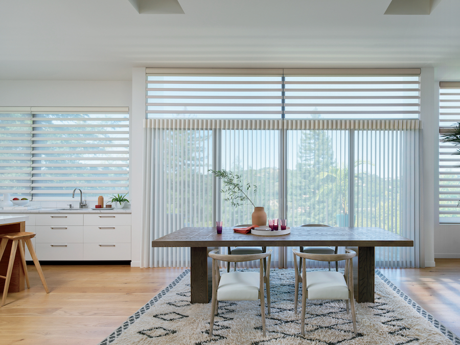 Vertical and horizontal cohesive window treatments.