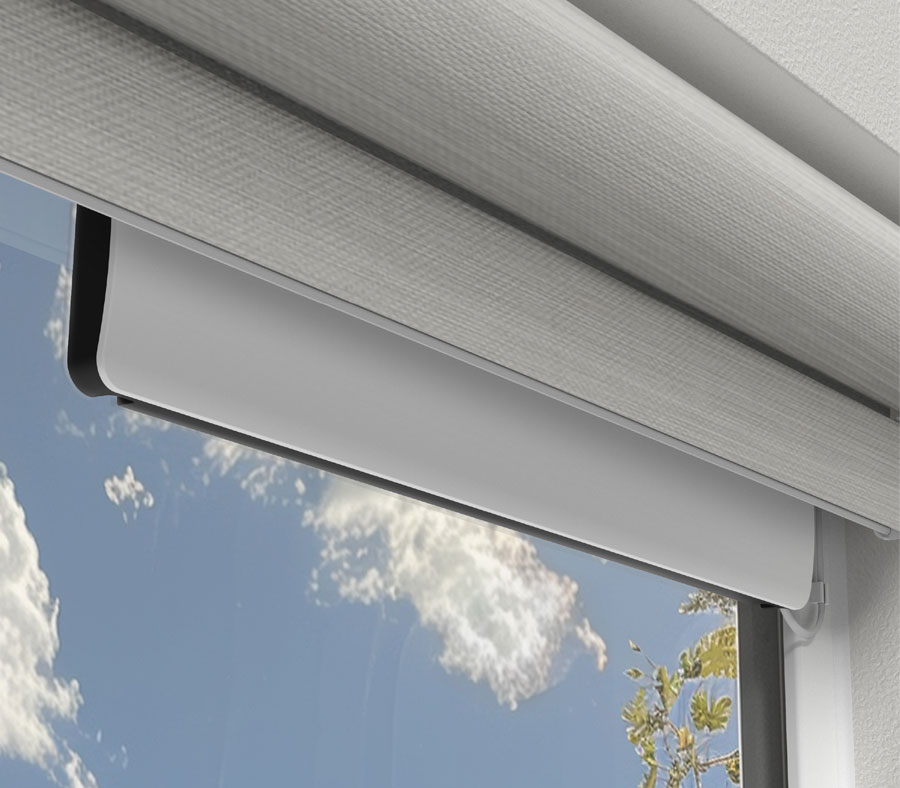 PowerView Solar Charger installed at a window for Hunter Douglas motorized shades