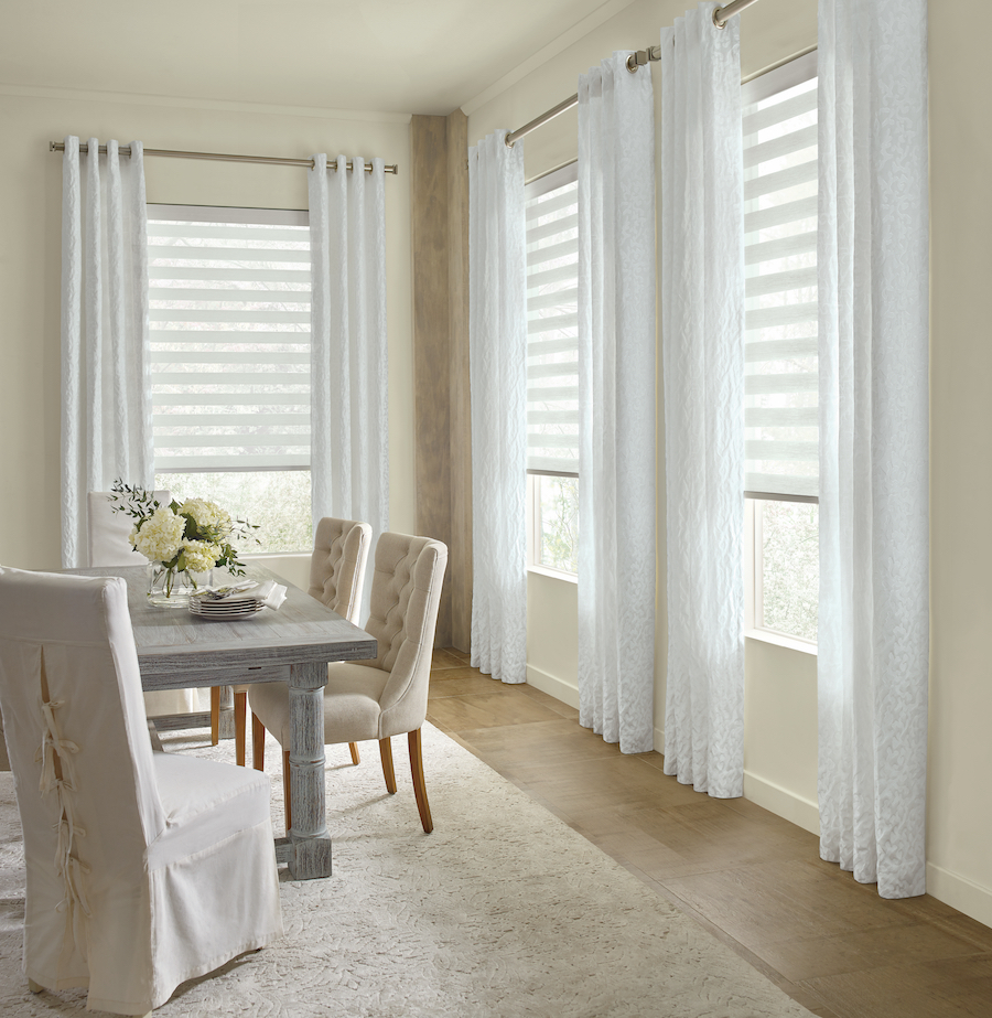 White draperies layered with shades in Denver CO dining room