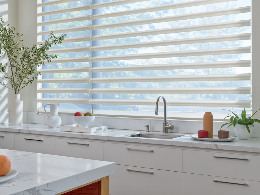 Sheer shades with fabric vanes in kitchen.