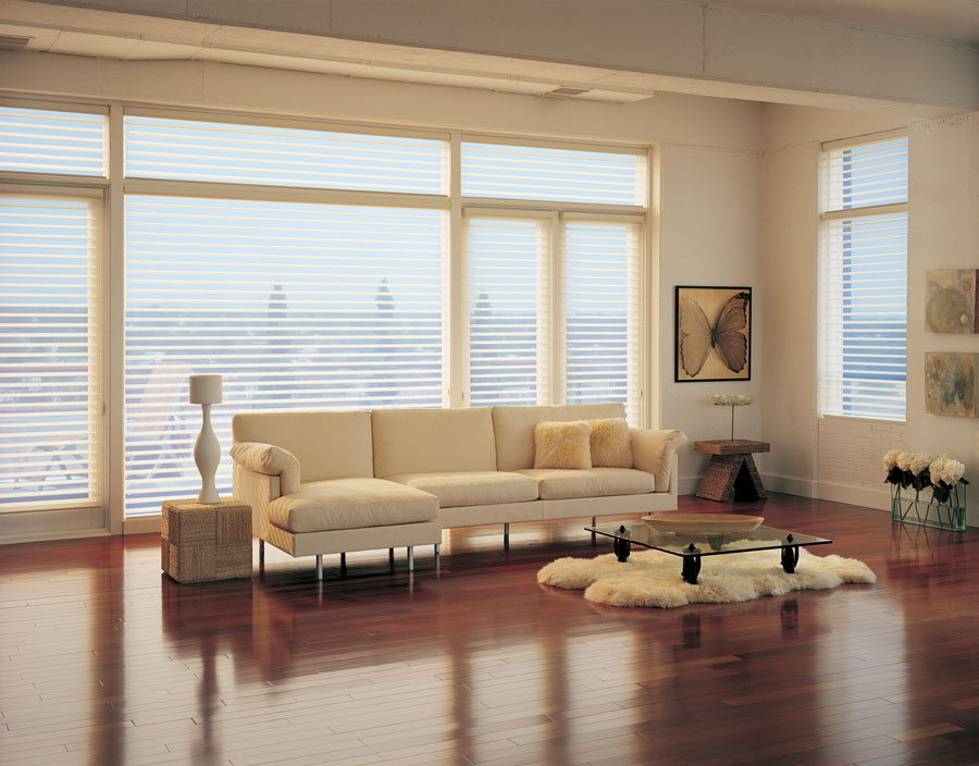 silhouette shades covering large north facing windows in living room of Denver home