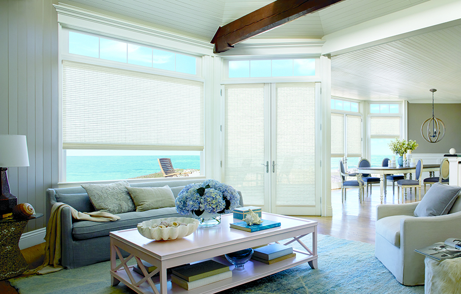 Woven wood french door shades in living room.