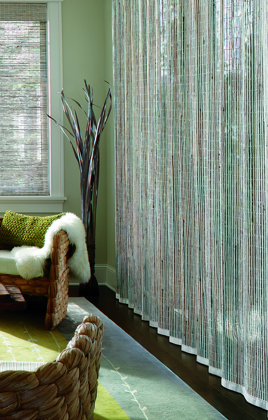 Woven woods vertical drapes by Rocky Mountain Shutters and Shades.