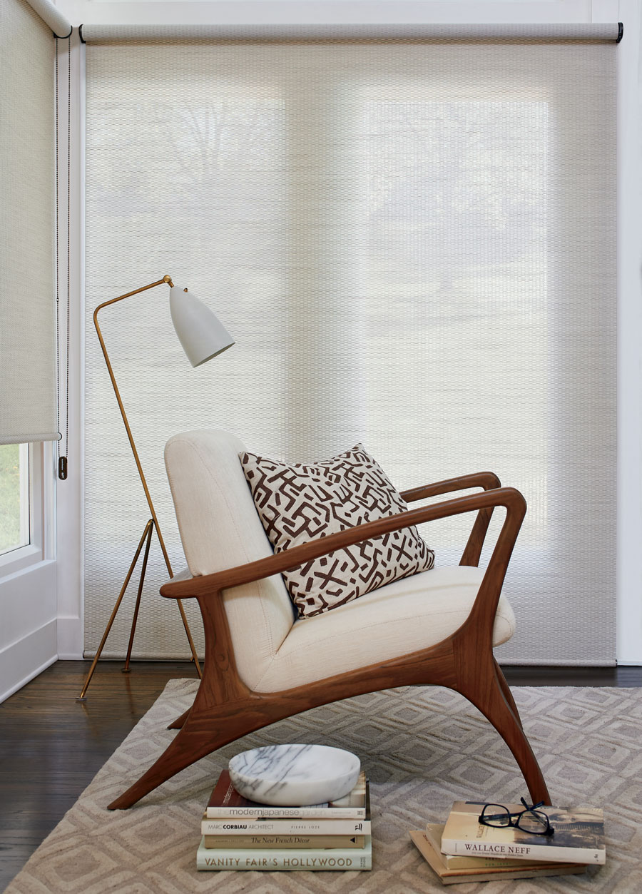 midcentury modern chair with textured roller shades in Westminster CO