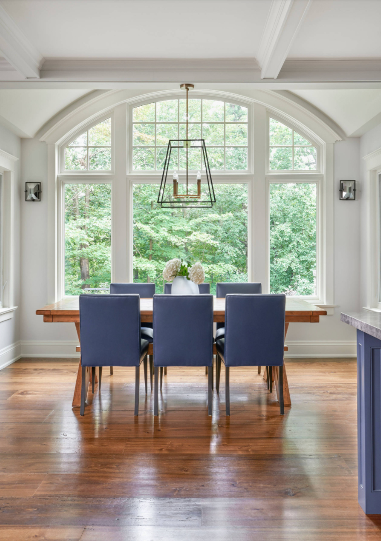 Periwinkle dining room chairs with wood table