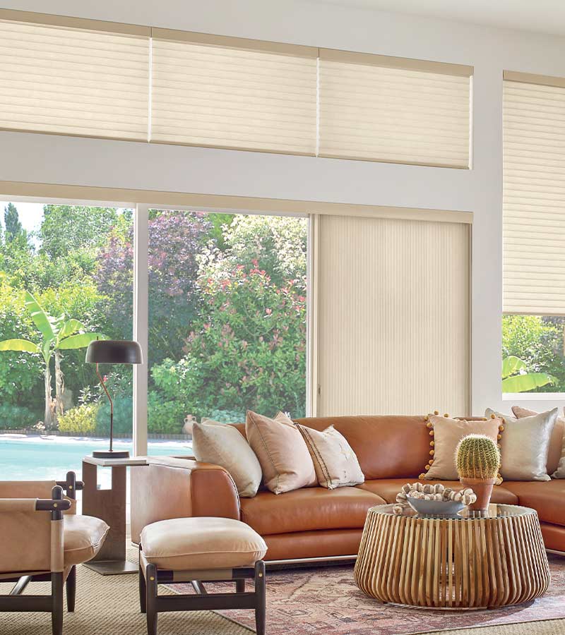 sliding window treatments for doors in southwestern decor living room overlooking pool in Denver, CO