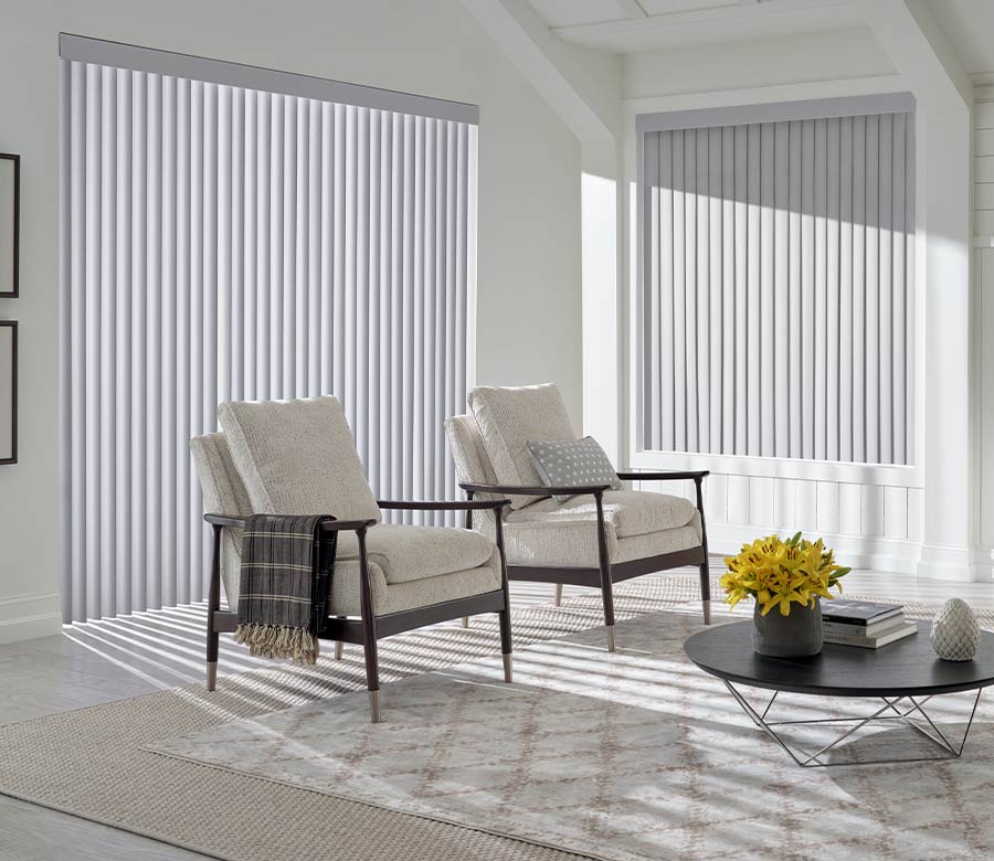 interior of living room space floor to ceiling window and modern armchairs in Park Meadows, CO