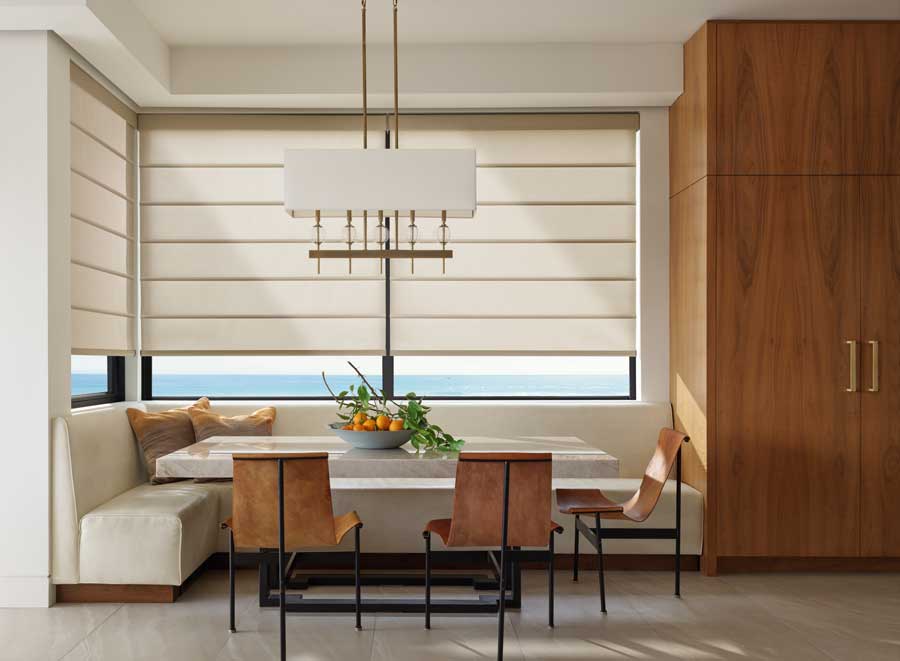 Alustra® Architectural Shades in a dining area of a home. Modern looking fixtures and decor.