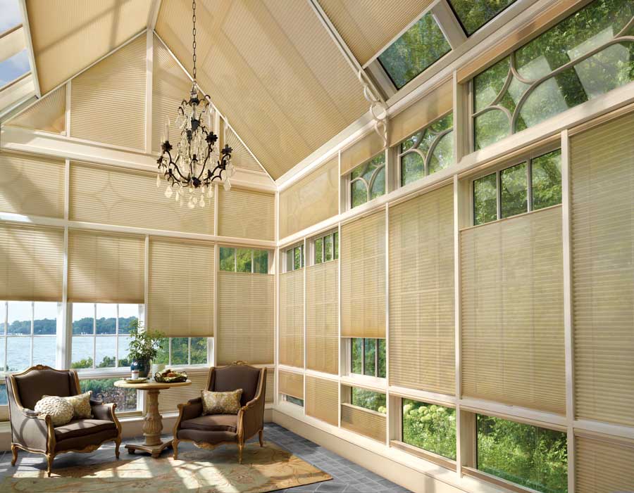 honeycomb shades protect sunroom windows in Denver