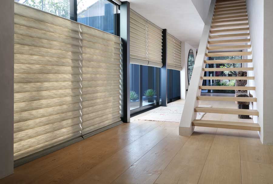 roman shades on staircase windows with top down feature