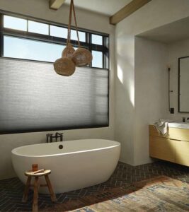 bathroom window treatments in front of large tub providing privacy and light control Denver CO home