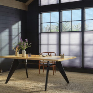 top down honeycomb shades in home office with light entering