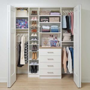 reach in closet in Denver with custom closet features drawers, hang bars, shelving