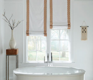 primary bathroom roman shades windows