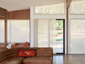 open floor plan with Silhouette shades on windows and Luminette privacy sheers on sliding doors in Denver home