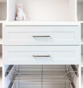 pull out hampers amd drawers in Denver custom closet to maximize closet space