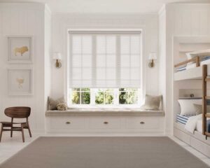 child's bedroom with bunk beds and window seating with cellular roller shades in Denver