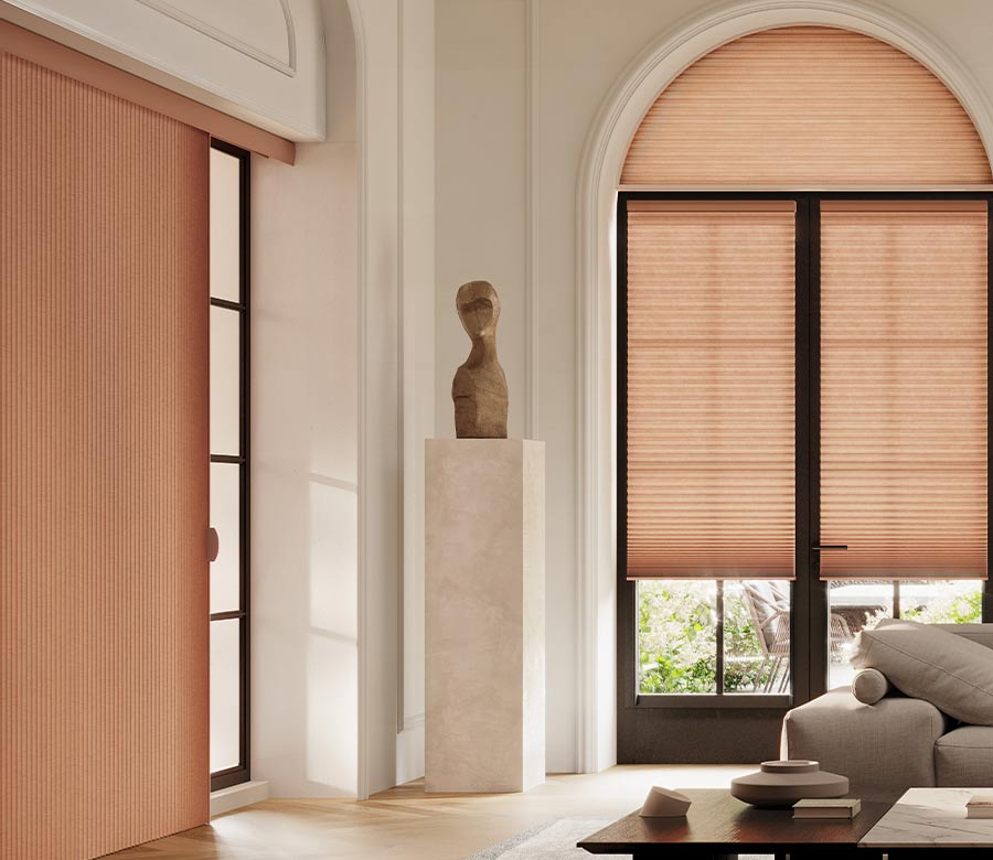 living room with peach vertical cellular shades duette vertiglide denver
