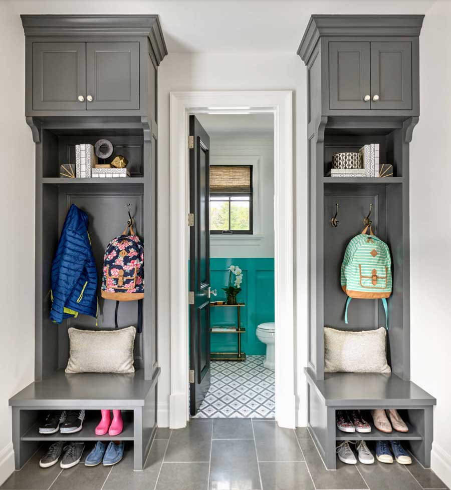 built-in mudroom cabinets on each side of a doorway