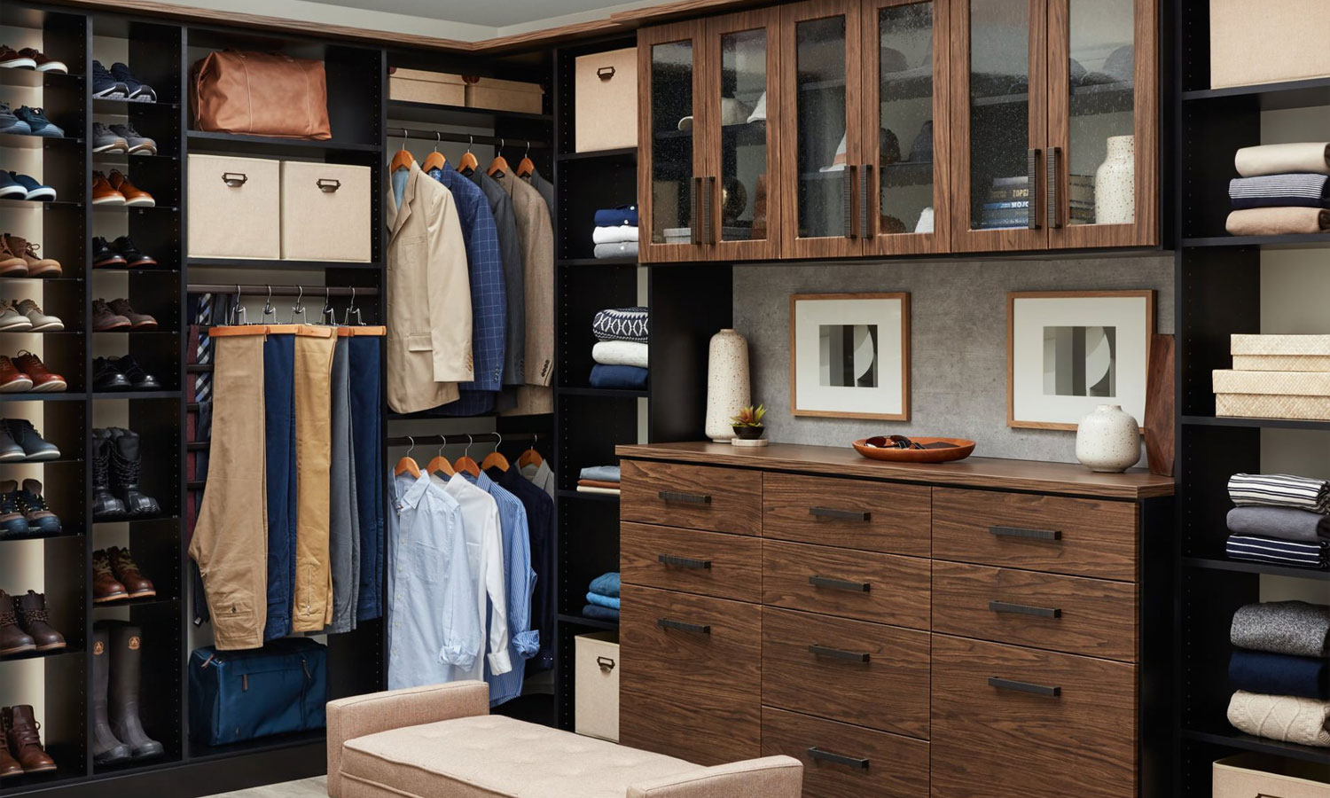 Walk-in closet with custom finishes and organized wardrobe storage