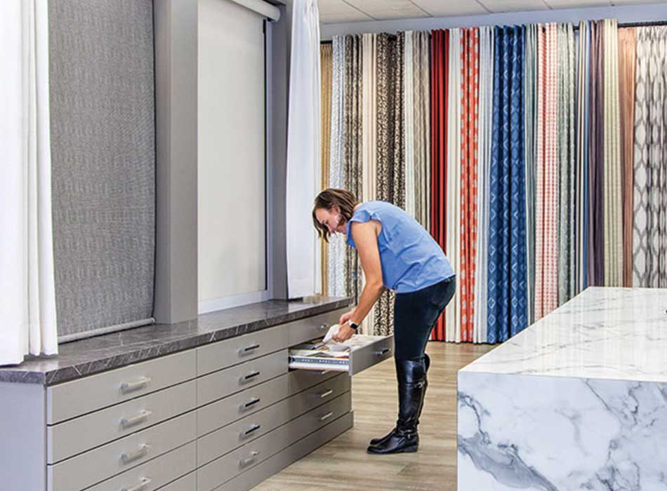 drapery options on wall during design consultation rocky mountain showroom