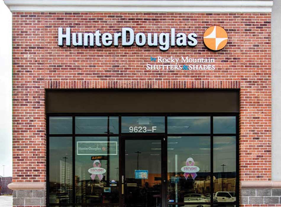 store front with hunter douglas sign rocky mountain shutters shades and closets showroom