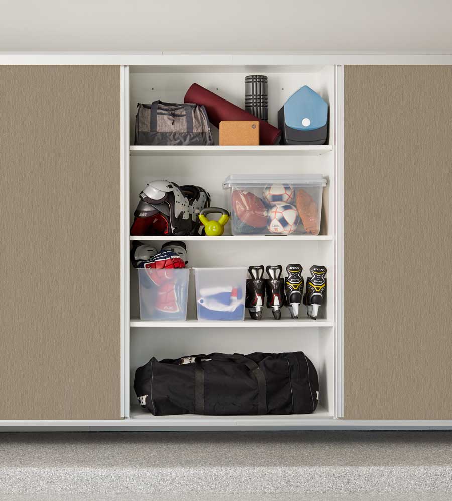 garage storage of outdoor gear with custom closet solutions in Denver