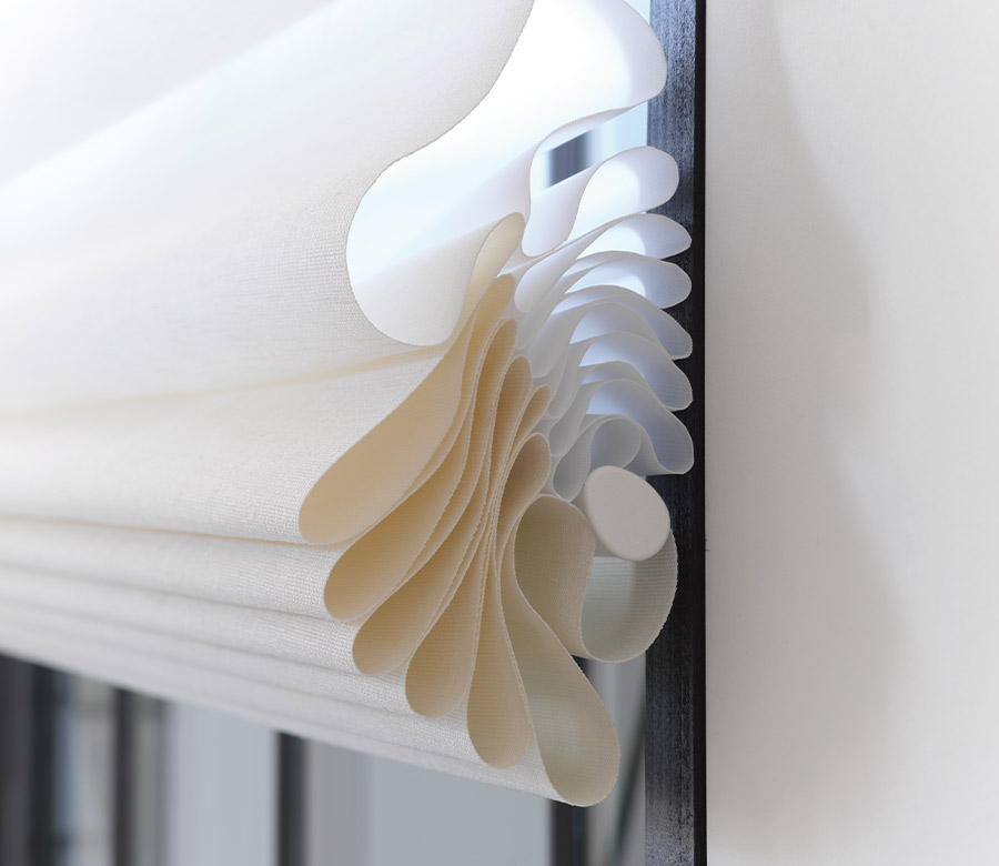 vignette-stacking-detail-roman-shades-hunter-douglas-rocky-mountain-shutters-shades-and-closets close up of a detial on stacking roman shades rocky mountain shutters shades and closets