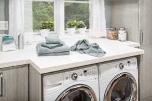 countertop in laundry room above appliances for folding station