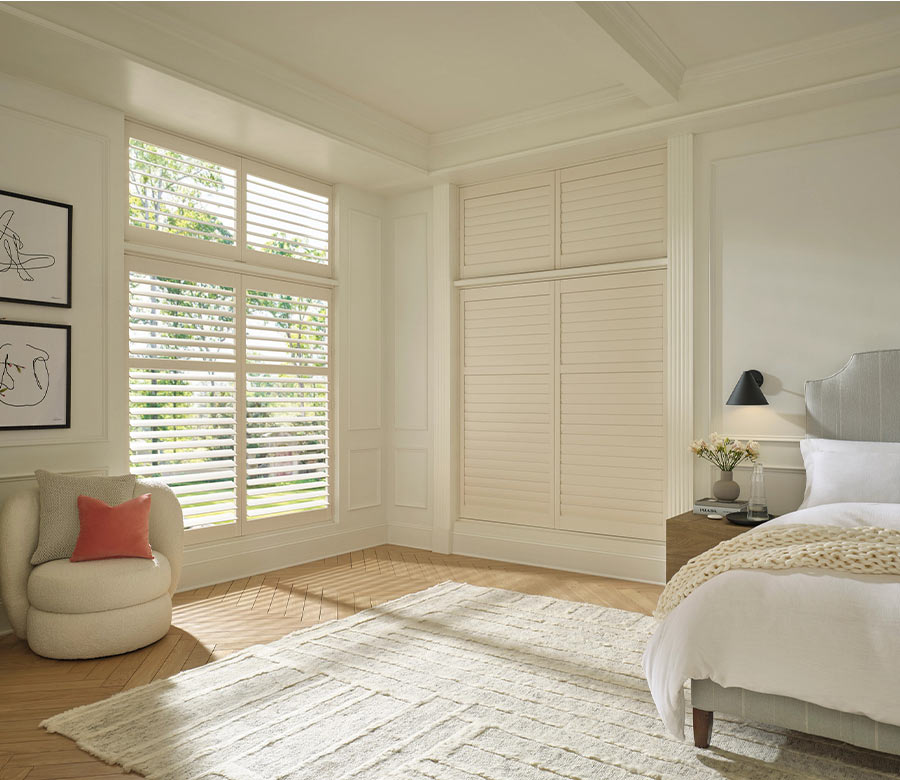 white vinyl shutters with standard hinge at window in living room