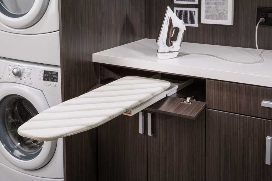 fold out swivel ironing board in laundry room
