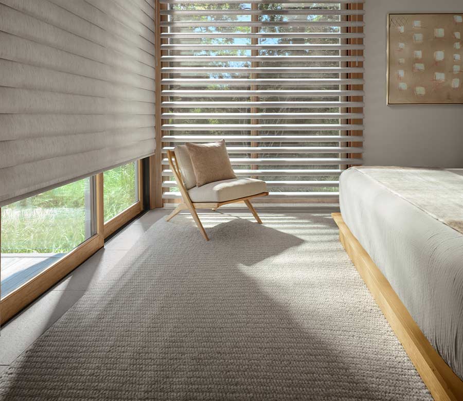 pirouette-primary-bedroom-window-treatments-hunter-douglas-rocky-mountain-shutters-shades-and-closets master bedroom with beige pirouette shades with closed and open vanes