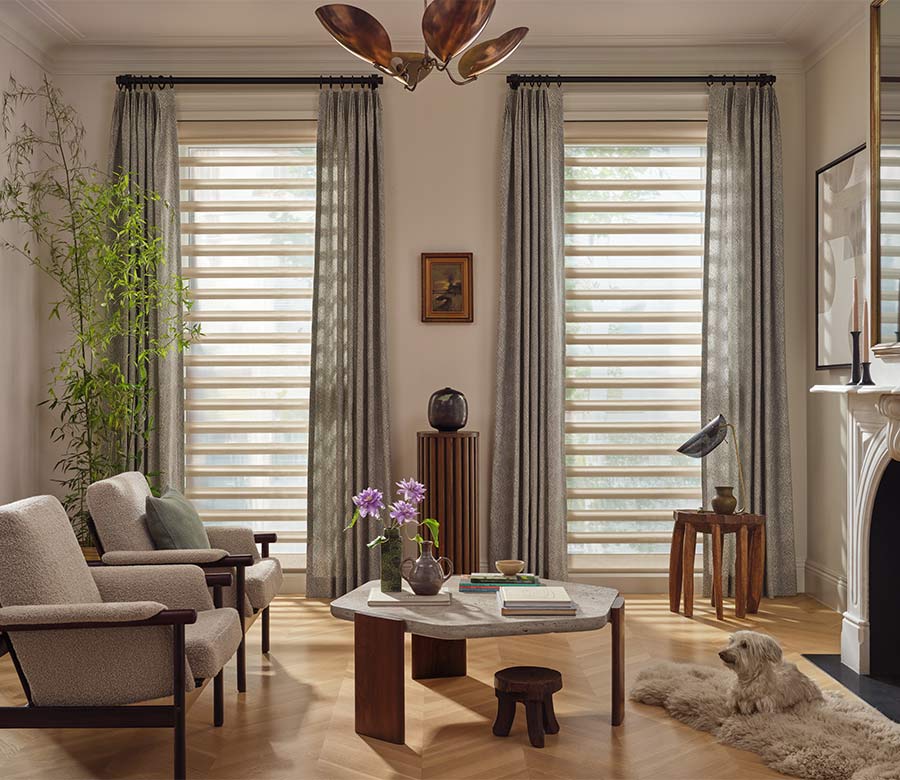 pirouette-window-treatments-sheer-curtains-layered-look-living-room-hunter-douglas-rocky-mountain-shutters-shades-and-closets Pirouette window shades with curtains in living room during daylight