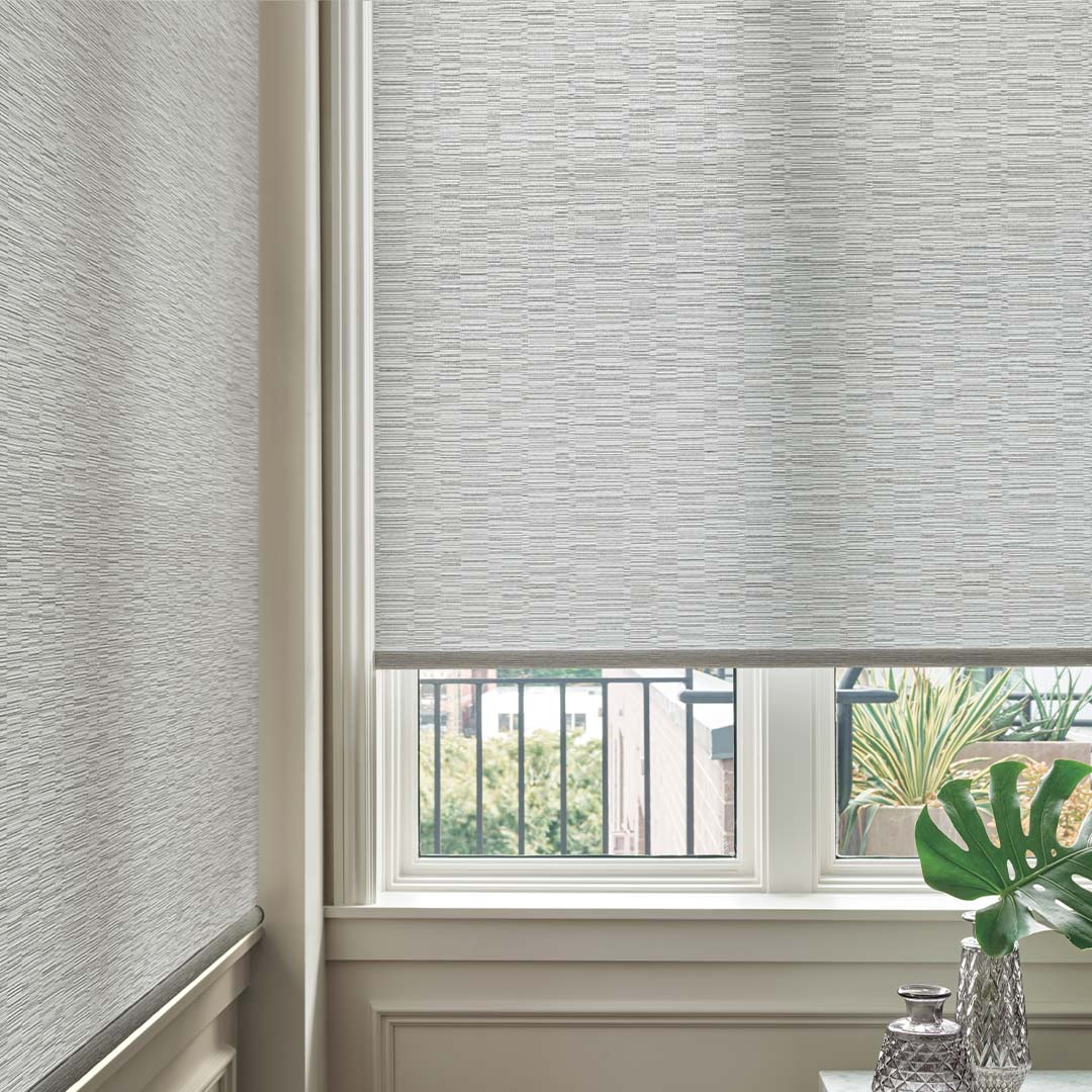 designer-roller-shades-detail-living-room-grey-featured-product-hunter-douglas-rocky-mountain-shutter-shades-closets