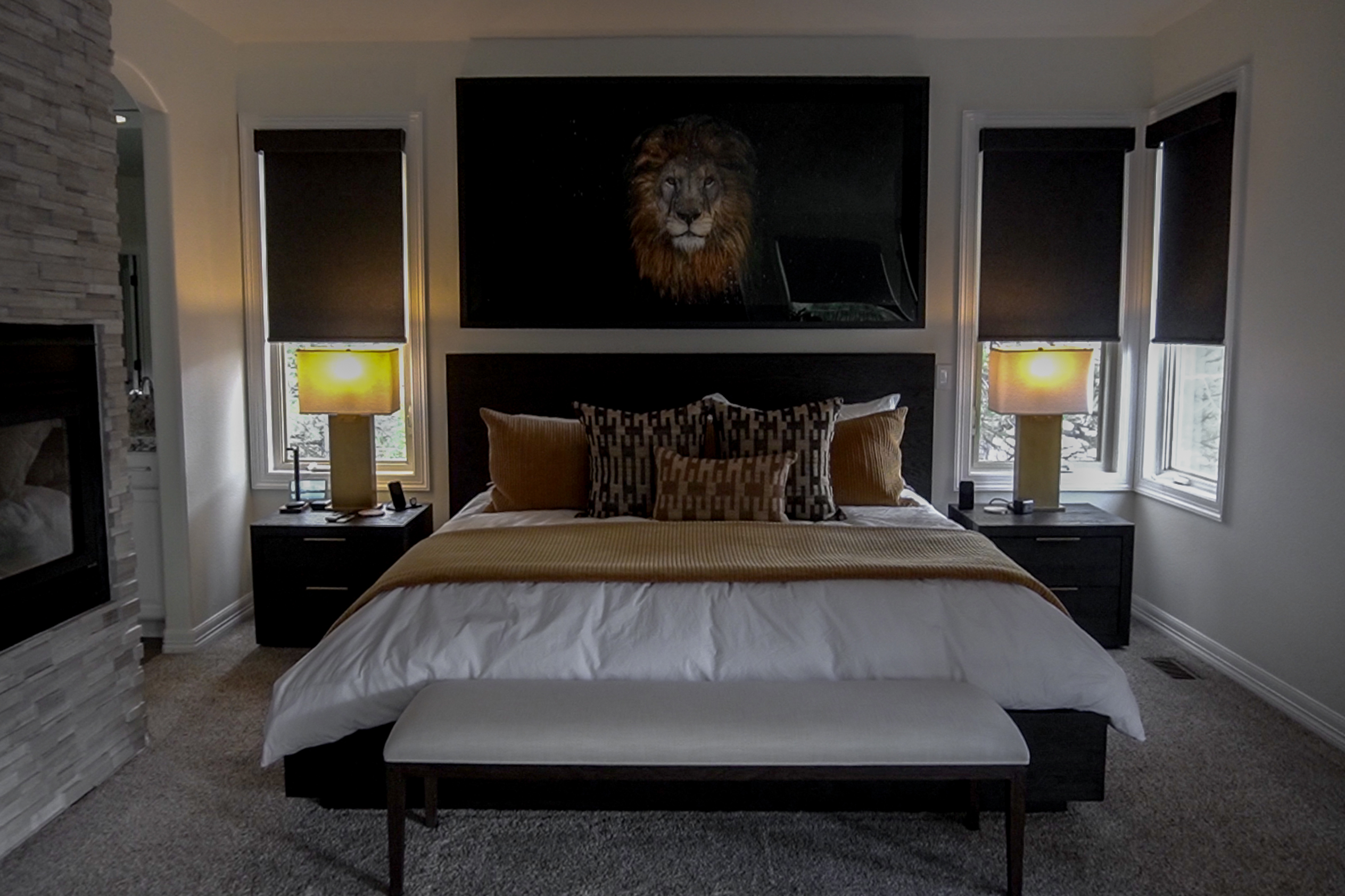 Blackout Designer Roller Shades installed in bedroom for improved sleep and privacy